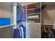 Organized walk-in closet with shelving, drawers, and hanging rods for ample storage at 3053 Cambridge Hill Dr, Dacula, GA 30019