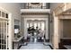 Grand foyer with marble floors, showcasing an open-concept design flowing into the living area at 3053 Cambridge Hill Dr, Dacula, GA 30019