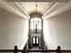 Grand foyer with tall ceilings, decorative chandelier, and a view of the front entrance at 3053 Cambridge Hill Dr, Dacula, GA 30019