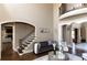 Welcoming foyer with staircase and views into adjacent living spaces at 3053 Cambridge Hill Dr, Dacula, GA 30019