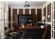 Elegant home office with custom built-ins, stylish decor, and natural light at 3053 Cambridge Hill Dr, Dacula, GA 30019