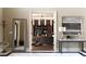 Stylish office featuring custom built-ins, hardwood floors, and sophisticated decor at 3053 Cambridge Hill Dr, Dacula, GA 30019