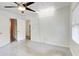 Bedroom featuring a ceiling fan, closet, and neutral decor at 3221 Colquitt Dr, Atlanta, GA 30340