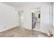 View of the dining room next to the kitchen with stainless steel refrigerator at 3221 Colquitt Dr, Atlanta, GA 30340