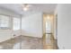 View of living room featuring windows, a ceiling fan, and a doorway at 3221 Colquitt Dr, Atlanta, GA 30340