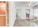 Bright living room featuring built-in shelves and tile floors at 3221 Colquitt Dr, Atlanta, GA 30340