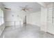 Living room featuring sleek tile floors, bright white walls, and natural light at 3221 Colquitt Dr, Atlanta, GA 30340