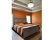 Bedroom with a tray ceiling, and a window to let in natural light at 1246 Foxcreek Dr, Mcdonough, GA 30252