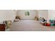 Spacious bonus room featuring plush carpeting and ample storage space at 1246 Foxcreek Dr, Mcdonough, GA 30252