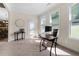 Bright office space with large windows, neutral walls, and plush carpeting at 1246 Foxcreek Dr, Mcdonough, GA 30252