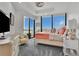 Comfortable bedroom featuring a plush bed, scenic views from large windows, and a serene atmosphere at 2828 Peachtree Nw Rd # 3100, Atlanta, GA 30305
