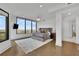Bright main bedroom suite with floor to ceiling windows, comfortable king bed, and city views at 2828 Peachtree Nw Rd # 3100, Atlanta, GA 30305