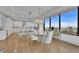 Open floor plan with modern dining area, eat-in kitchen, and floor-to-ceiling windows with great city views at 2828 Peachtree Nw Rd # 3100, Atlanta, GA 30305