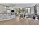 Bright open-concept living space featuring sleek modern finishes and large windows at 2828 Peachtree Nw Rd # 3100, Atlanta, GA 30305