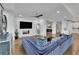 Large living room boasts a modern fireplace, comfortable seating, and an open concept living space at 2828 Peachtree Nw Rd # 3100, Atlanta, GA 30305