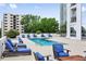 Refreshing rooftop pool area with comfortable lounge chairs and city views at 2828 Peachtree Nw Rd # 3100, Atlanta, GA 30305