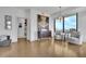 Sitting room featuring floor to ceiling windows with city views, modern light fixture, and artistically decorated at 2828 Peachtree Nw Rd # 3100, Atlanta, GA 30305