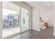 View of an outdoor balcony with sliding glass doors leading to a bedroom featuring hardwood floors at 379 Pratt Se Dr # 408, Atlanta, GA 30315