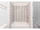 Bathroom featuring a tiled tub and shower combination at 379 Pratt Se Dr # 408, Atlanta, GA 30315