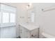 Bathroom with modern white vanity and gray hardware at 379 Pratt Se Dr # 408, Atlanta, GA 30315