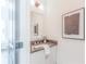 Powder room with modern vanity and framed art at 379 Pratt Se Dr # 408, Atlanta, GA 30315
