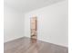 Bedroom with hardwood floors and white walls, with bathroom access at 379 Pratt Se Dr # 408, Atlanta, GA 30315