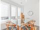 Bright dining room with natural lighting and a glass dining table at 379 Pratt Se Dr # 408, Atlanta, GA 30315