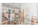 Dining room with glass table and decor next to kitchen and living room at 379 Pratt Se Dr # 408, Atlanta, GA 30315