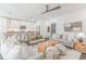 Open-concept living room flows into a modern kitchen with an island and seating at 379 Pratt Se Dr # 408, Atlanta, GA 30315