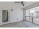 Outdoor patio with modern railing, ceiling fan and access to other buildings at 379 Pratt Se Dr # 408, Atlanta, GA 30315
