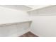 Walk-in closet with installed shelving and a hardwood floor at 379 Pratt Se Dr # 408, Atlanta, GA 30315