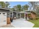 Inviting exterior showcasing gray siding, brickwork, covered entry, and garage at 1185 Winterberry Ct, Lawrenceville, GA 30043