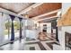 Modern kitchen featuring sleek white cabinets, granite countertops, and a large window view at 1185 Winterberry Ct, Lawrenceville, GA 30043