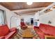 Spacious living room with wooden ceilings, beams, and fireplace at 1185 Winterberry Ct, Lawrenceville, GA 30043