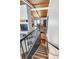Staircase leading down to the basement with tile flooring and wood ceiling at 1185 Winterberry Ct, Lawrenceville, GA 30043
