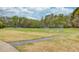 Expansive community field with lush green grass perfect for outdoor activities and recreation at 1343 Riverview Run Ln, Suwanee, GA 30024