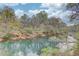 Picturesque view of the calm river at 1343 Riverview Run Ln, Suwanee, GA 30024