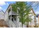 Inviting two-story home with a charming front porch and mature trees at 770 Reed Se St, Atlanta, GA 30315
