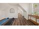 Hallway with yoga mats, hardwood floors, and large window at 770 Reed Se St, Atlanta, GA 30315