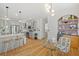 Stylish kitchen with gray cabinetry, stainless steel appliances, and a dining area at 770 Reed Se St, Atlanta, GA 30315