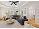 Bright living room with hardwood floors, tray ceiling, and large windows at 770 Reed Se St, Atlanta, GA 30315