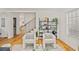 Cozy living room with hardwood floors, a staircase, and stylish decor at 770 Reed Se St, Atlanta, GA 30315