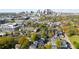 Aerial view of the neighborhood showcases tree-lined streets and the vibrant Atlanta skyline at 770 Reed Se St, Atlanta, GA 30315