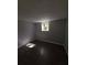 Spacious bedroom with hardwood floors and natural light from window at 8154 Tudor Dr, Jonesboro, GA 30238