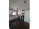 Bright kitchen featuring new appliances, white cabinetry, and granite countertops at 8154 Tudor Dr, Jonesboro, GA 30238