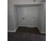 Laundry room with grey walls and flooring at 8154 Tudor Dr, Jonesboro, GA 30238
