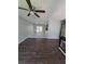 View of living room showing new flooring and sliding doors to outdoor patio or deck at 8154 Tudor Dr, Jonesboro, GA 30238