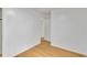Neutral-toned bedroom with wood-look floors and ample natural light at 1077 Mainstreet Valley Dr, Stone Mountain, GA 30088