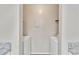Bright laundry room features granite countertops and a full-size washer and dryer at 1077 Mainstreet Valley Dr, Stone Mountain, GA 30088
