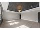 Spacious bedroom with decorative ceiling and plenty of natural light at 1688 Mineral Springs Rd, Hoschton, GA 30548
